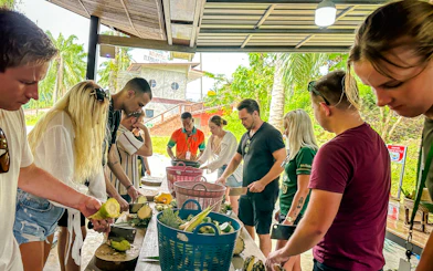 Visitors preparing food at Krabi Roaming Elephant Sanctuary, Krabi.