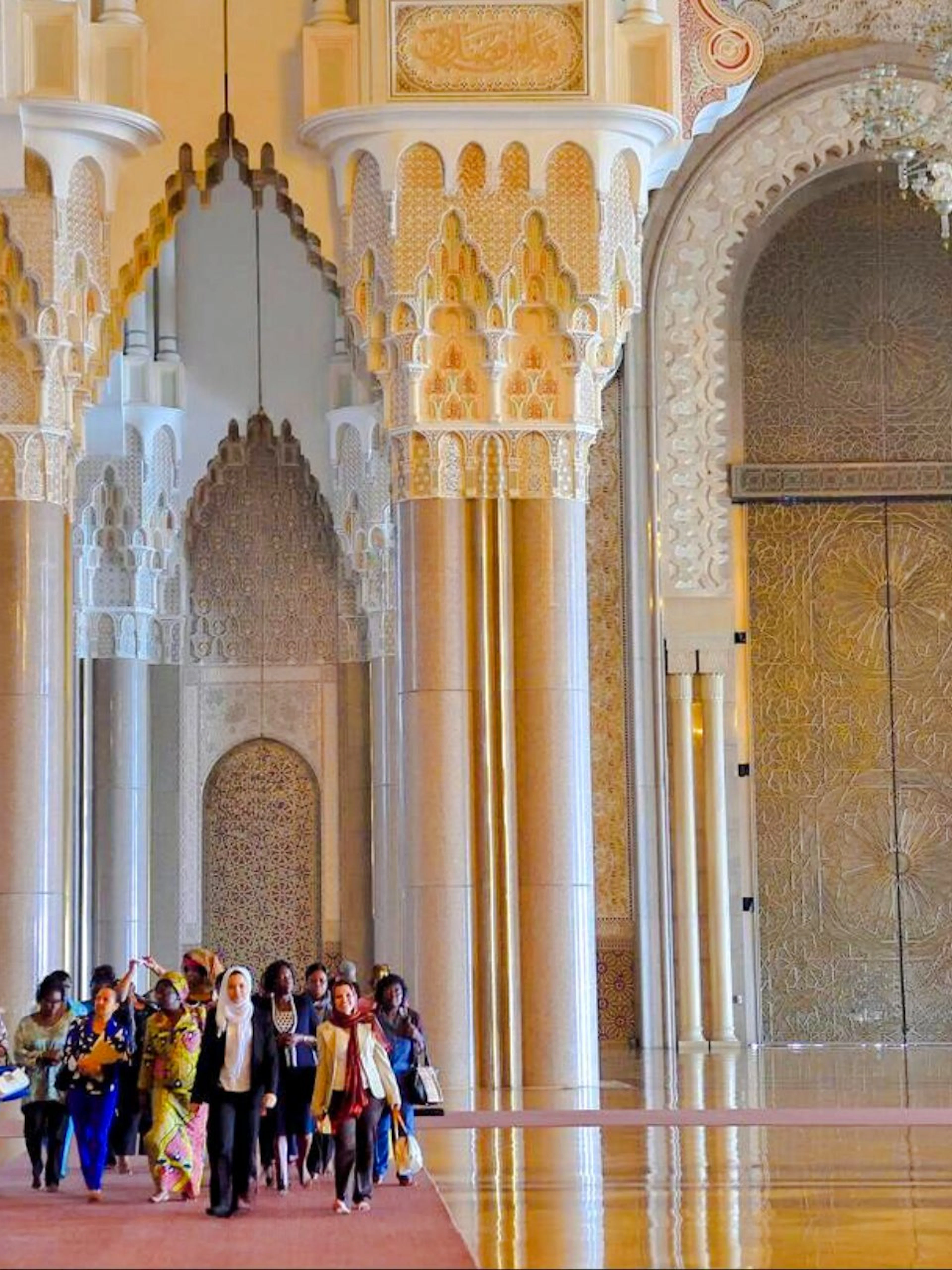 Group touring Hassan II Mosque interior, Casablanca, Morocco.