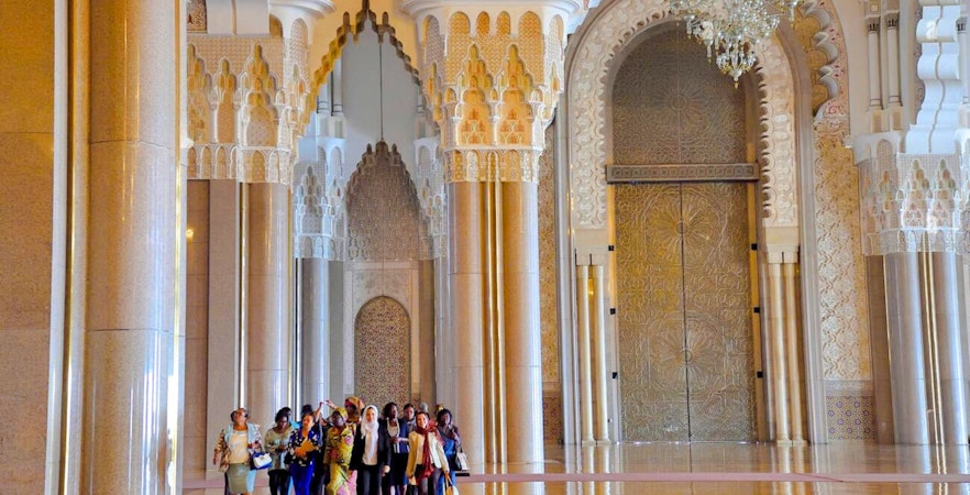Group touring Hassan II Mosque interior, Casablanca, Morocco.