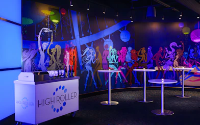 High Roller Wheel lounge interior with colorful mural, Las Vegas.