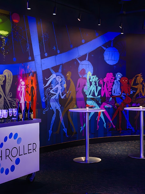 High Roller Wheel lounge interior with colorful mural, Las Vegas.