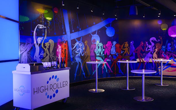 High Roller Wheel lounge interior with colorful mural, Las Vegas.