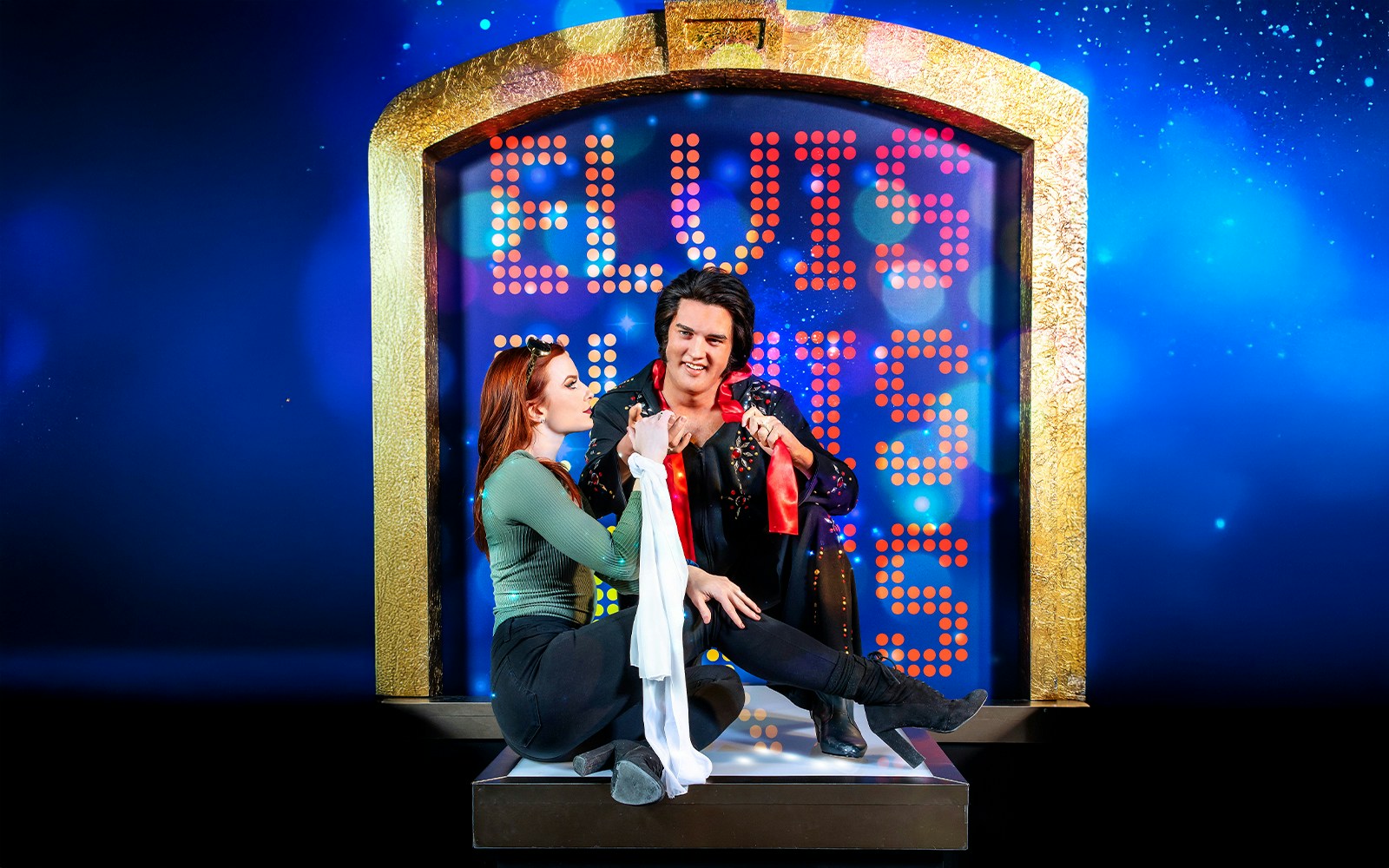 Elvis statue with visitor at Madame Tussauds Las Vegas.