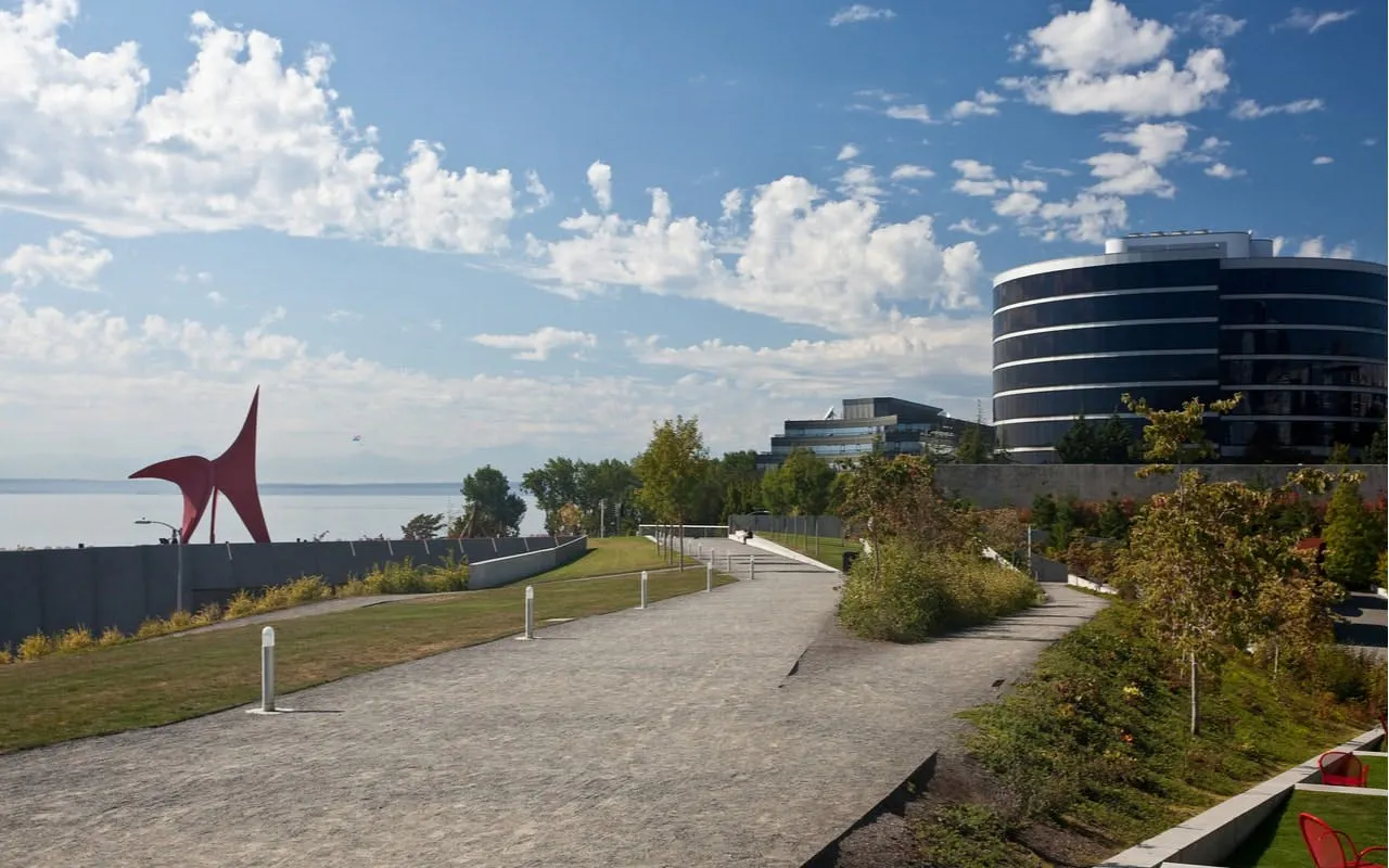 Seattle Olympic Sculpture Park with red sculpture and modern buildings.