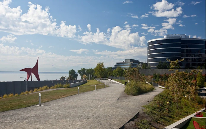 Seattle Olympic Sculpture Park with red sculpture and modern buildings.