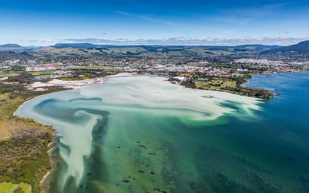 Aerial view of Rotorua's geothermal landscape near Mount Tarawera, New Zealand.