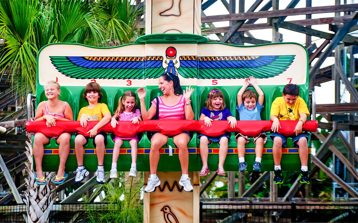 People enjoying the Beetle Bounce ride at LEGOLAND Theme Park, Florida.