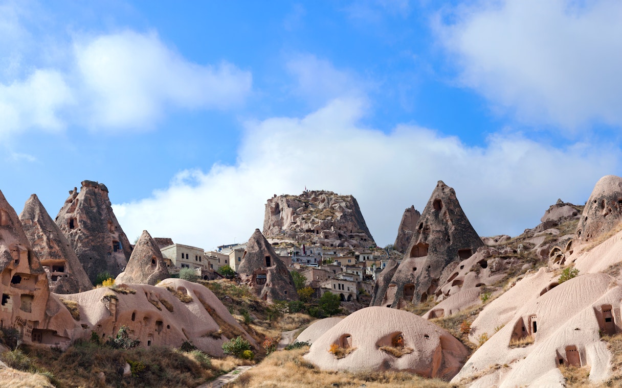 Rock formations and cave dwellings in Pigeon Valley, Cappadocia, Turkey.