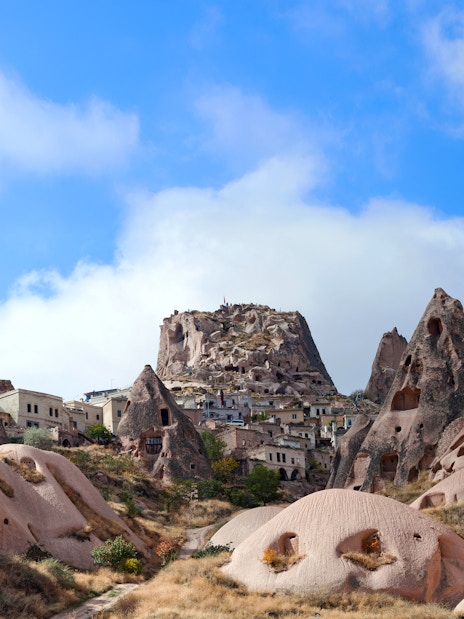 Rock formations and cave dwellings in Pigeon Valley, Cappadocia, Turkey.
