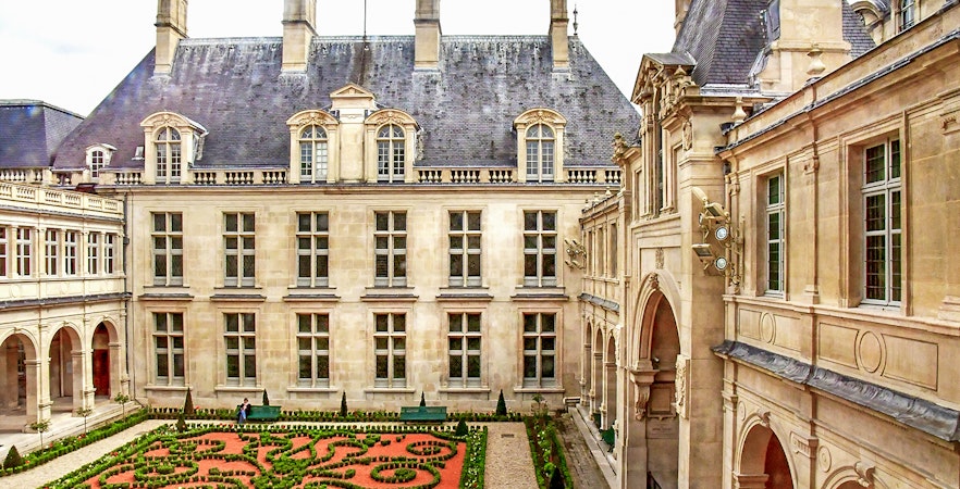 Carnavalet Museum courtyard with manicured garden, Paris.