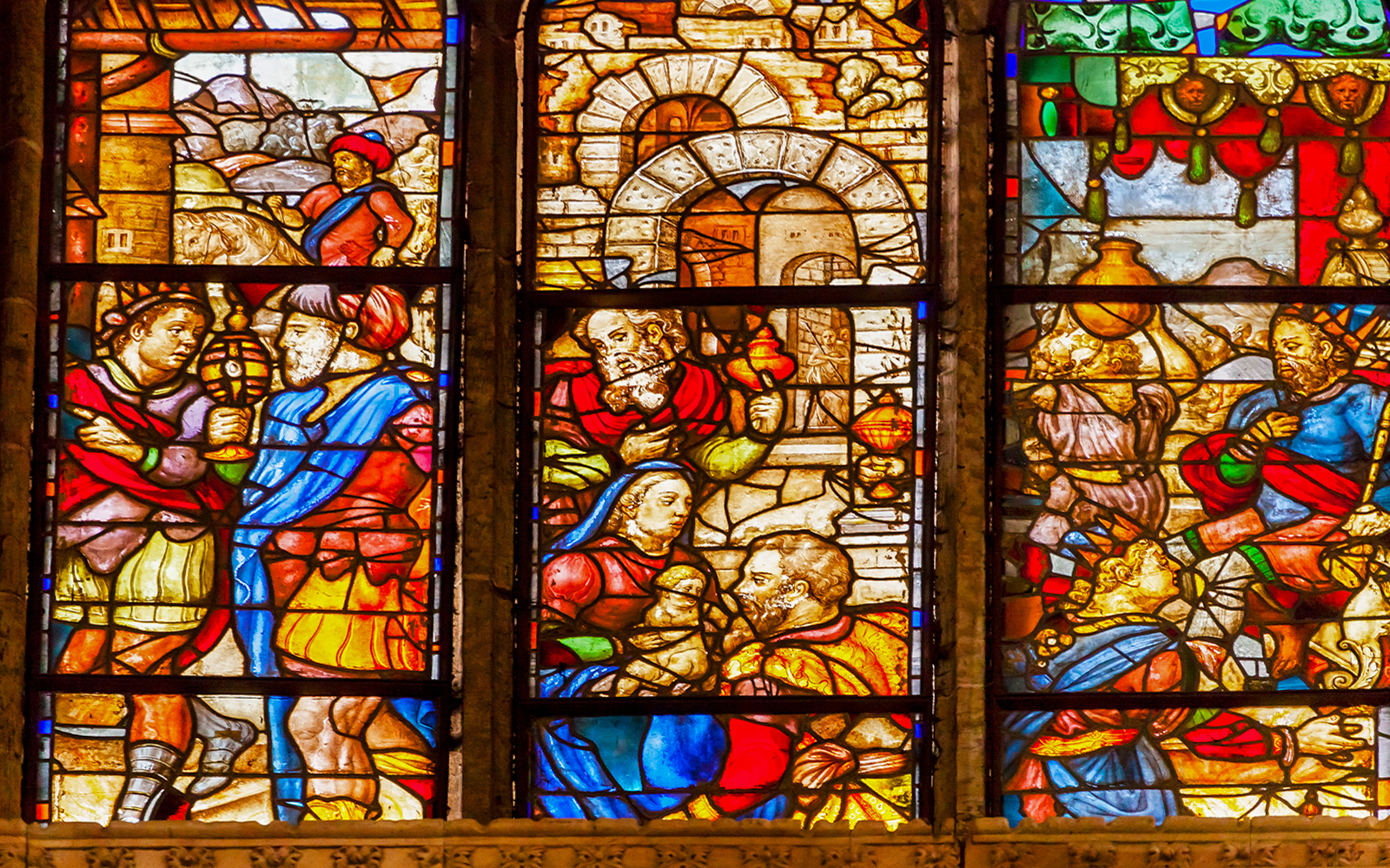 Stained glass depicting merchants in Salamanca New Cathedral, Spain.