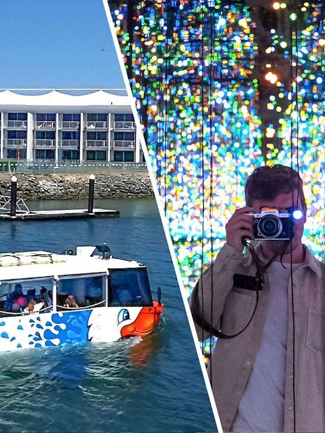 Quack'rDuck tour boat on Gold Coast waterway and person photographing colorful light display.