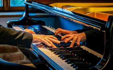Pianist performing at Chopin Concert, Royal Castle Complex, Warsaw.