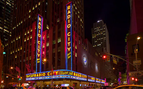 Radio City Music Hall illuminated at night, New York City.