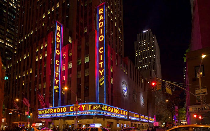 Radio City Music Hall illuminated at night, New York City.