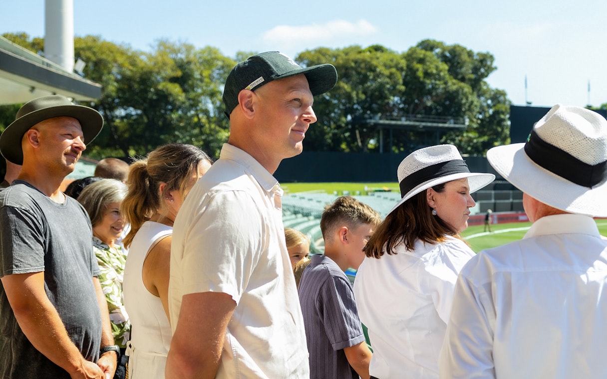 Visitors enjoying a sunny day at Adelaide Oval Stadium.