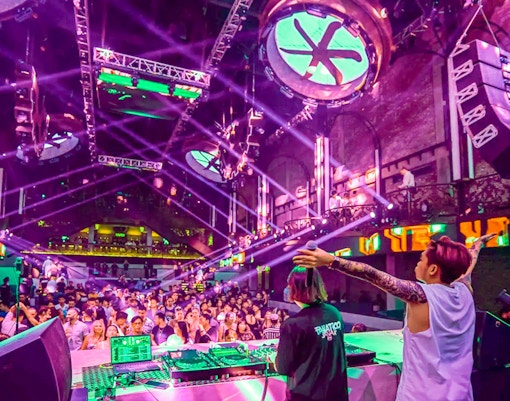 Attendees dancing at Atlas Beach Club in Bali