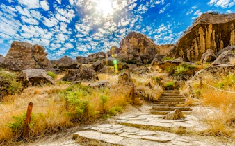 Stone path leading through rocky terrain at Gobustan National Park, Baku.