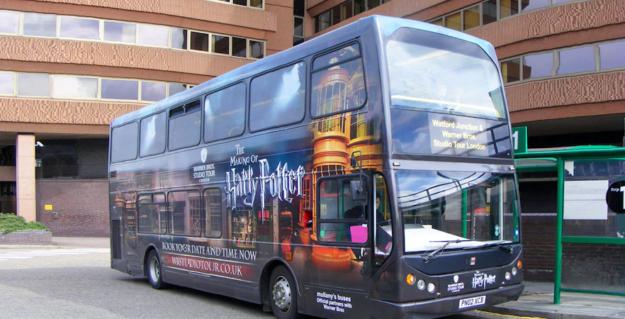 Double-decker bus for Harry Potter Studio Tour at Watford Junction.