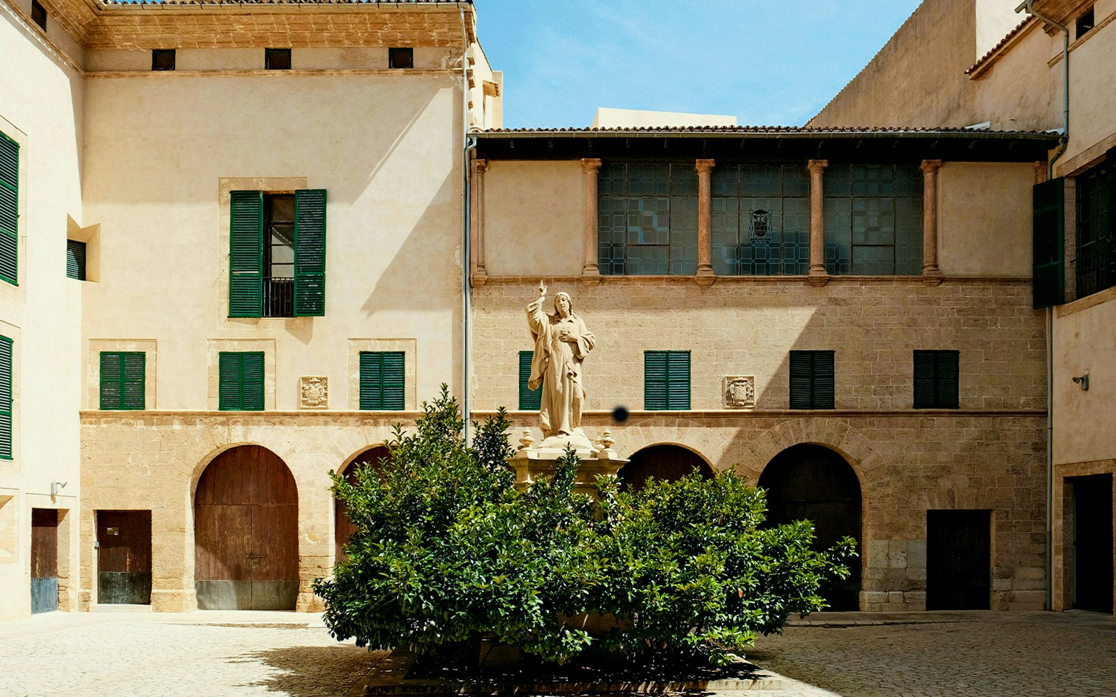 Exterior view of Museu Diocesà, Museum of Sacred Art of Mallorca, showcasing its historic architecture.