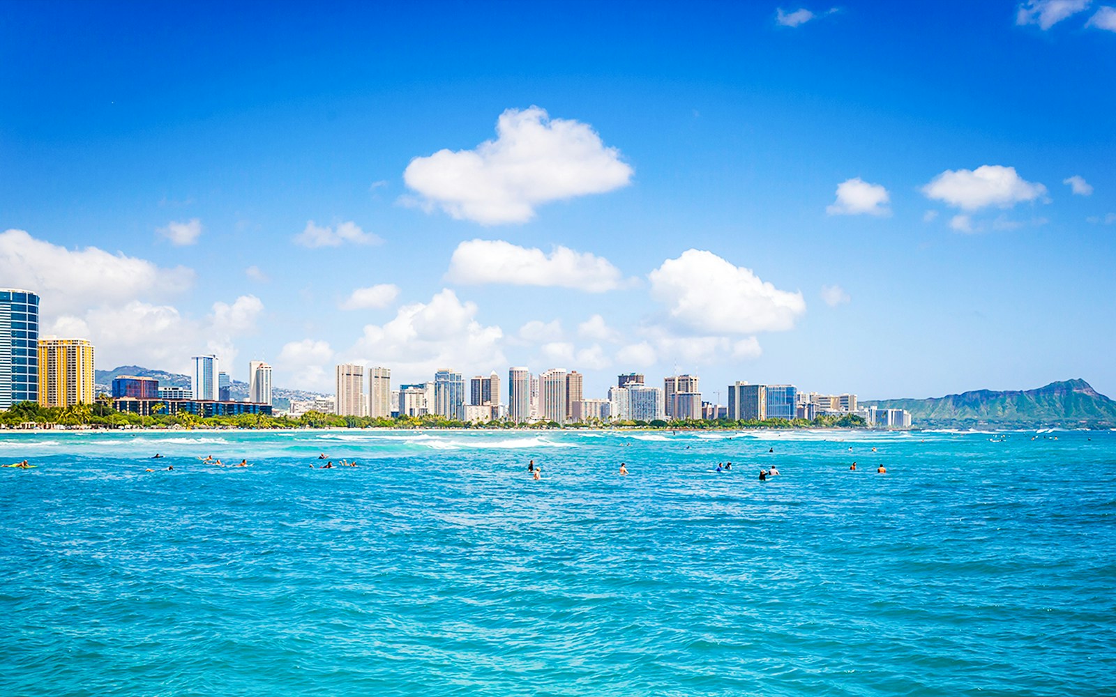Honolulu skyline viewed from a glass-bottom boat in Hawaii.