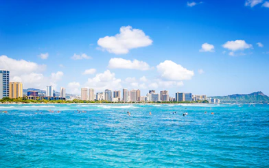 Honolulu skyline viewed from a glass-bottom boat in Hawaii.