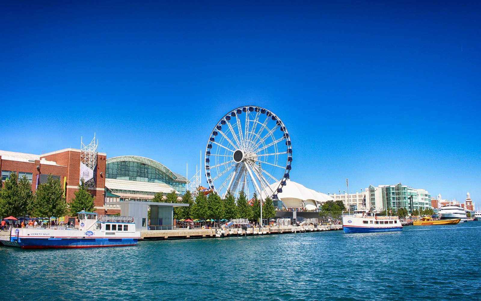 Ferris wheel and boats at Navy Pier, Chicago.