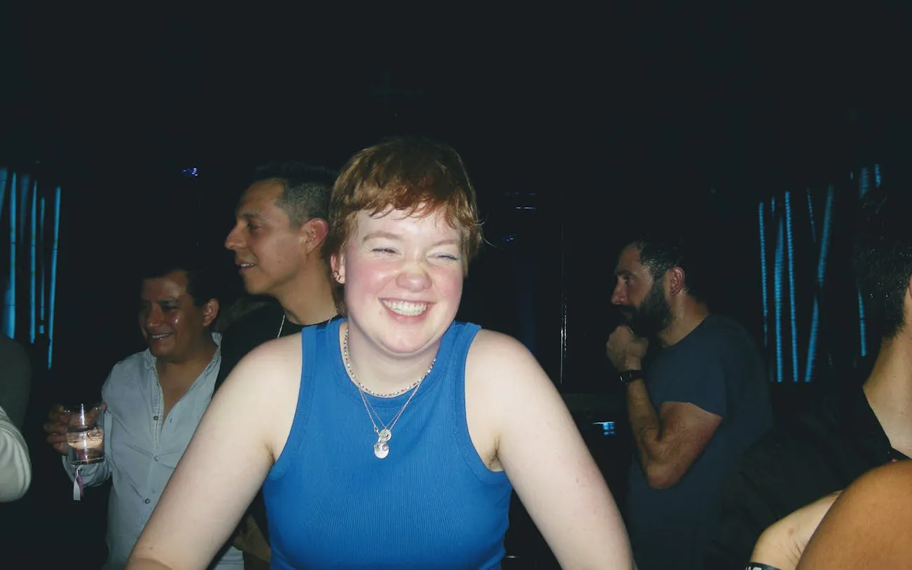 Group enjoying a lively night out during a Barcelona pub crawl.