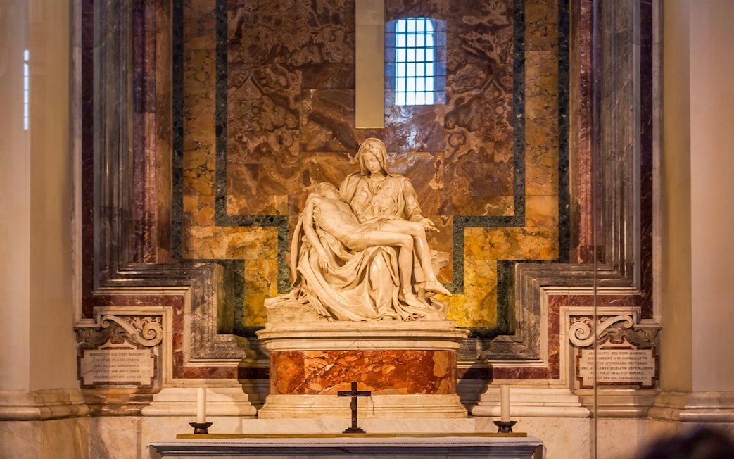 St. Peter's Basilica interior with Michelangelo's Pietà statue.