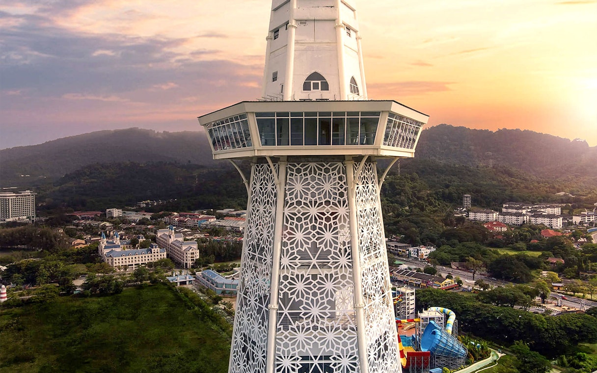Maha Tower in Malaysia with intricate design and panoramic view of surrounding landscape.
