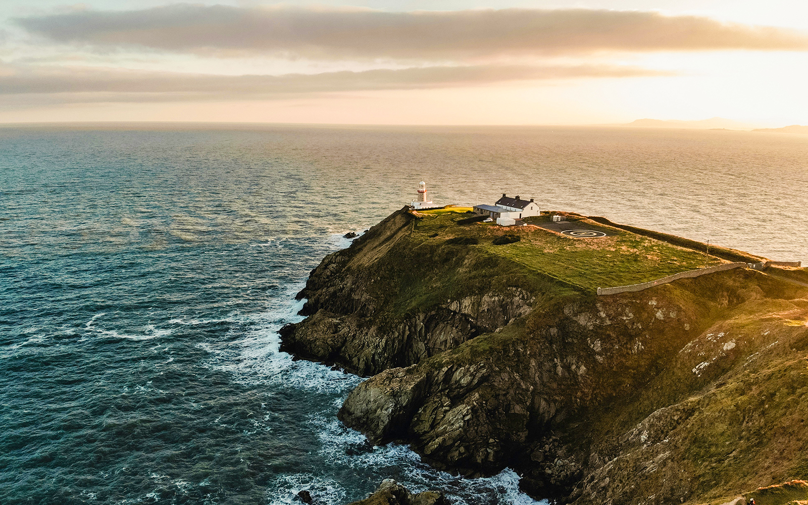 Howth Cliffs in Dublin with scenic coastal views and rugged landscape during sunset