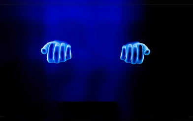 Glowing blue hands exhibit at Interactive DeJa Vu Museum Berlin.