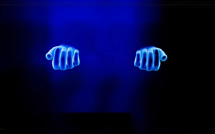Glowing blue hands exhibit at Interactive DeJa Vu Museum Berlin.