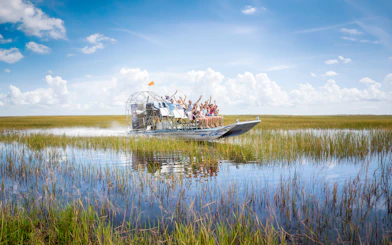 Guests enjoying an airboat ride through the Everglades, Miami.