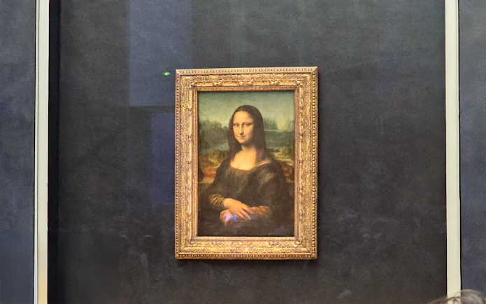 Mona Lisa painting at the Louvre Museum in Paris.