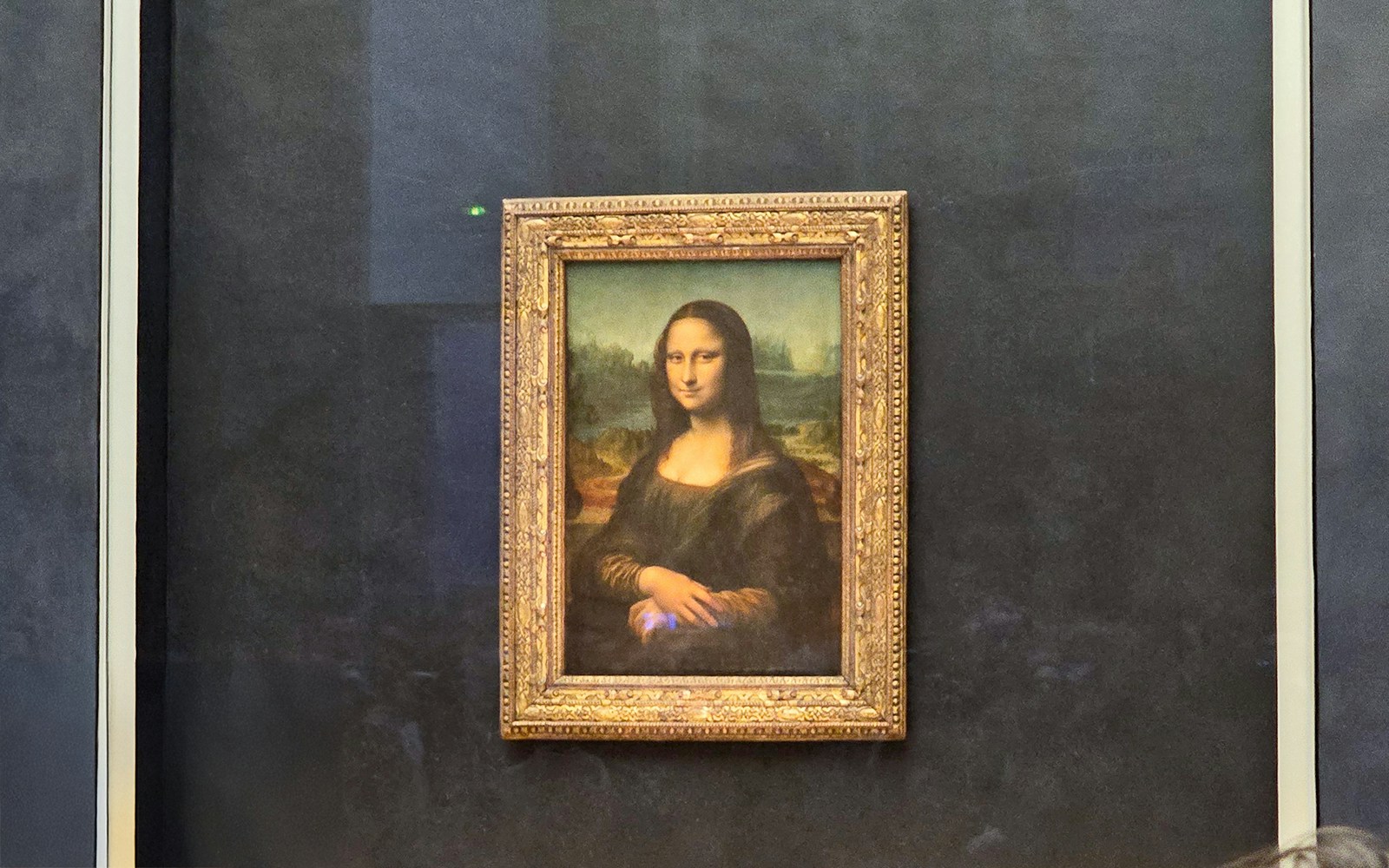 Mona Lisa painting at the Louvre Museum in Paris.