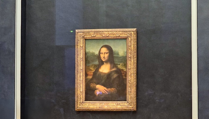 Mona Lisa painting at the Louvre Museum in Paris.