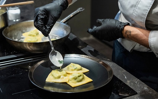 Chef preparing ravioli in Rome cooking class.