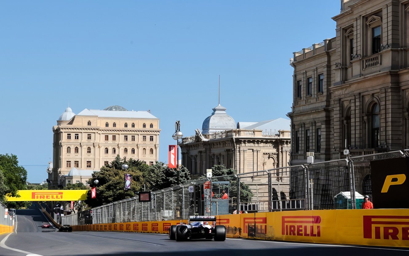 Formula 1 car racing on Baku city circuit during Azerbaijan Grand Prix 2026.