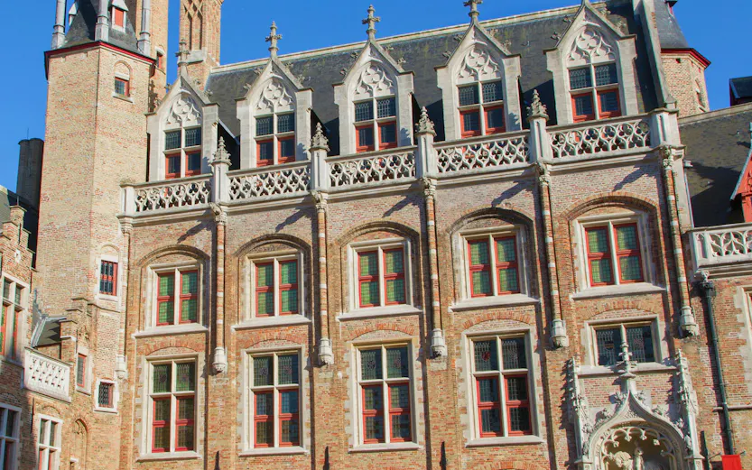 Gruuthusemuseum facade with Gothic architecture in Bruges, Belgium.