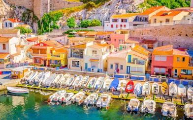 Colorful houses and boats at Vallon des Auffes harbor, Marseille, France.