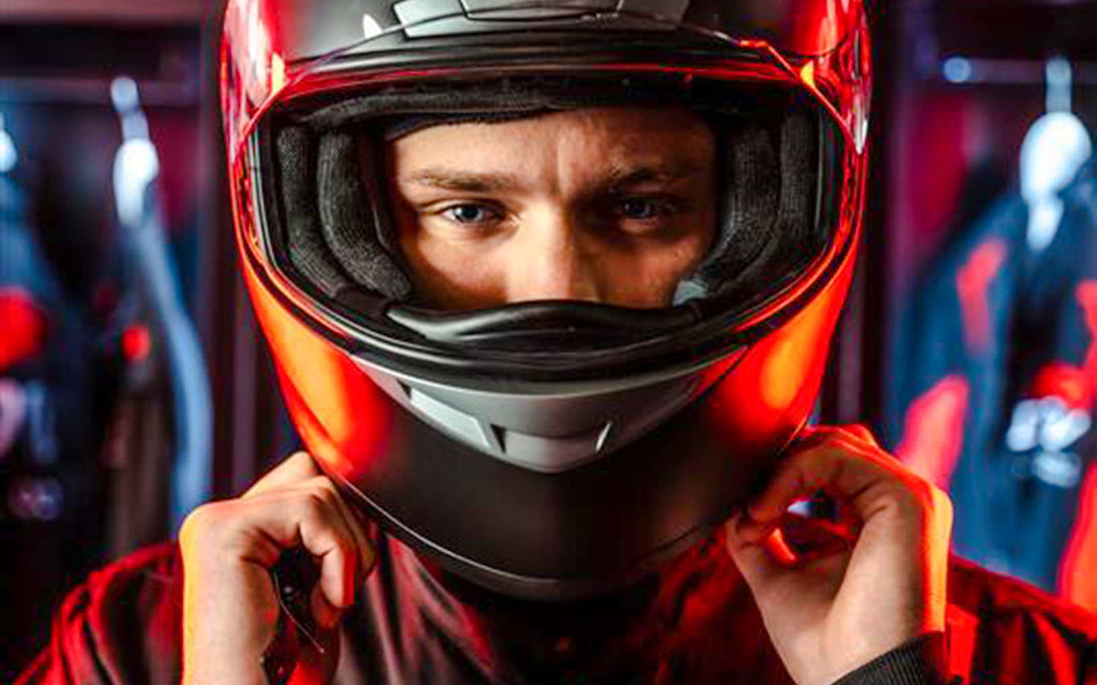 Guest preparing for F1 Experience in London with helmet on.