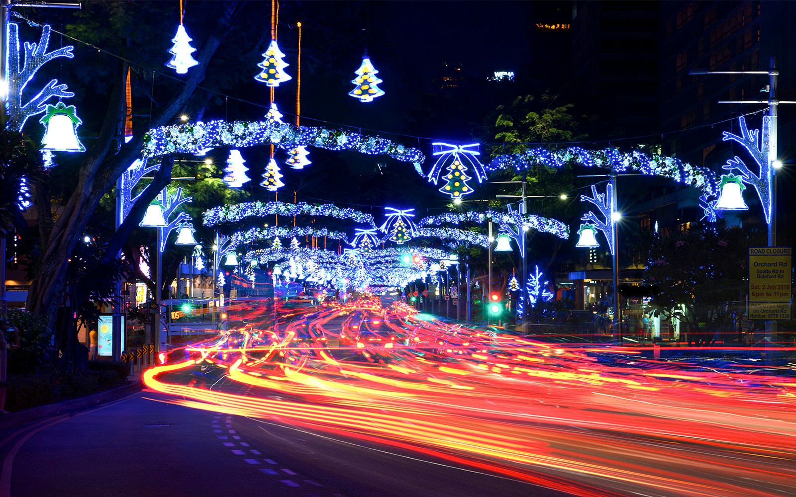 Orchard Road in Singapore illuminated with Christmas lights and festive decorations.
