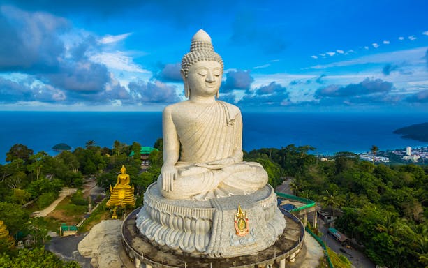 Big Buddha statue overlooking the sea in Phuket, Thailand.