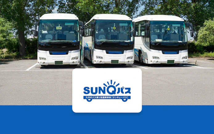 Tour buses parked in Japan with SunQ Pass logo.