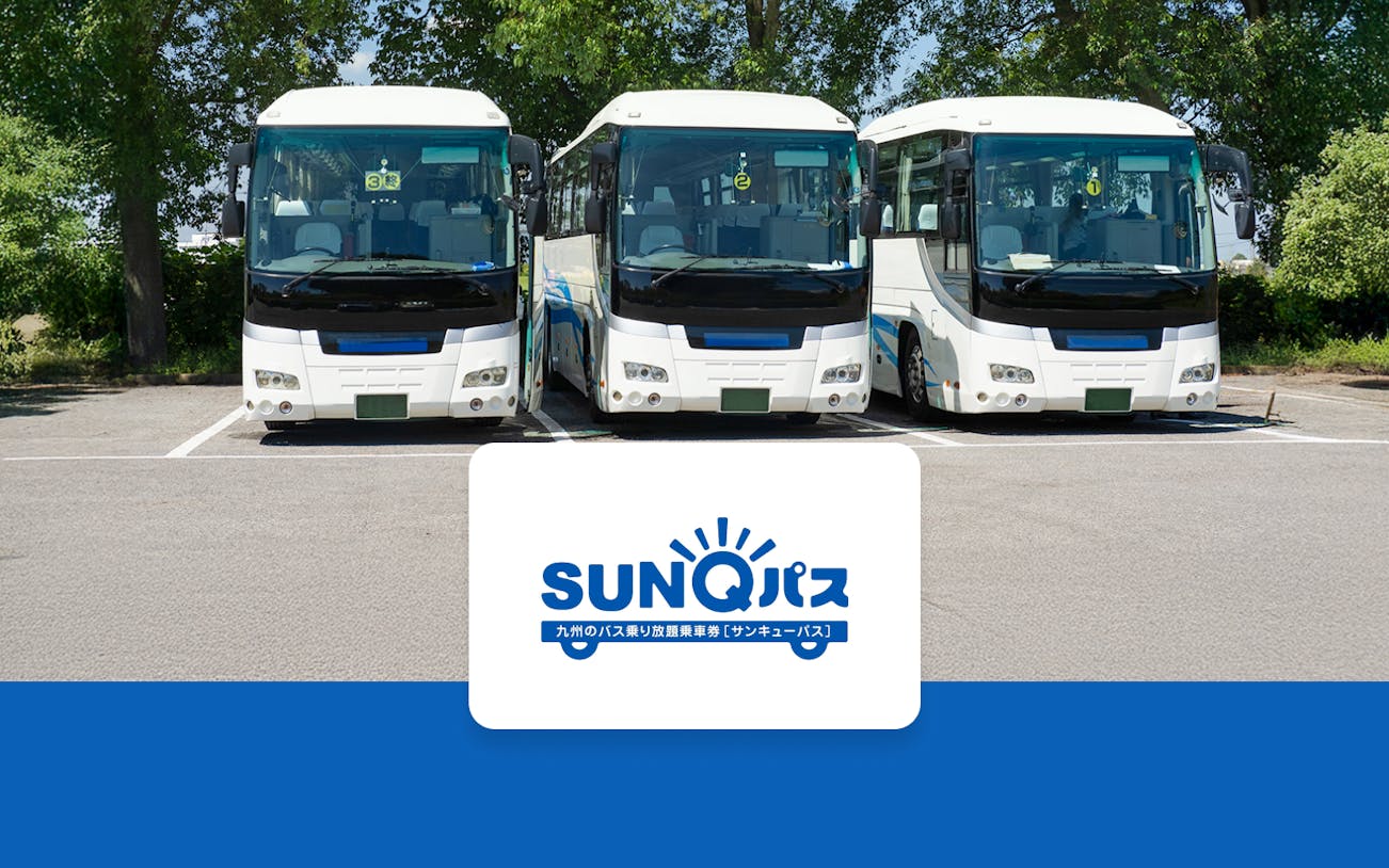 Tour buses parked in Japan with SunQ Pass logo.
