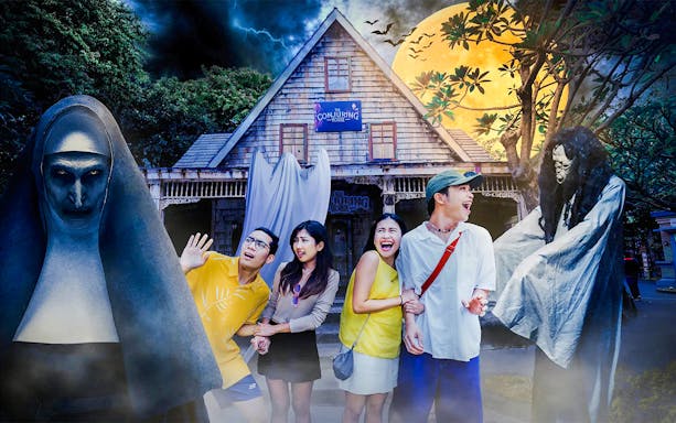 Visitors react to spooky characters at the Conjuring House, Dunia Fantasi Dufan Theme Park.