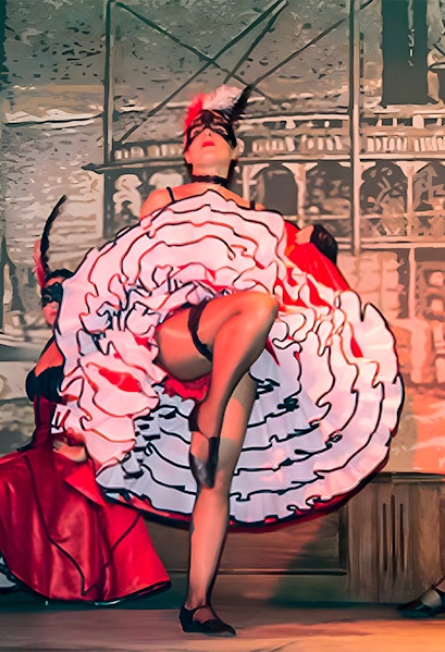 Performer in can-can dress dancing at Oasys Mini Hollywood, Spain.