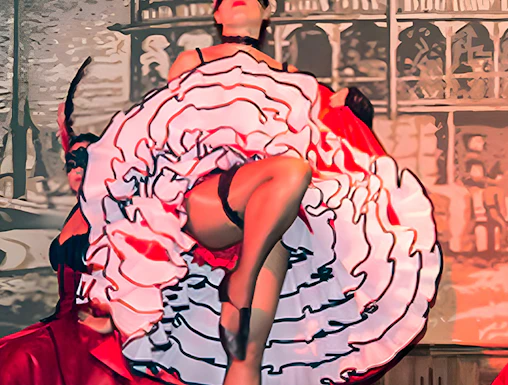 Performer in can-can dress dancing at Oasys Mini Hollywood, Spain.