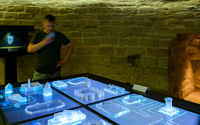 Interactive exhibit at Maiden Tower Museum, Baku, showcasing illuminated architectural models.